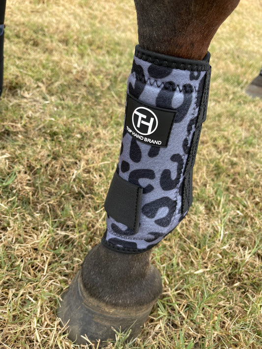 Gray cheetah sport boots